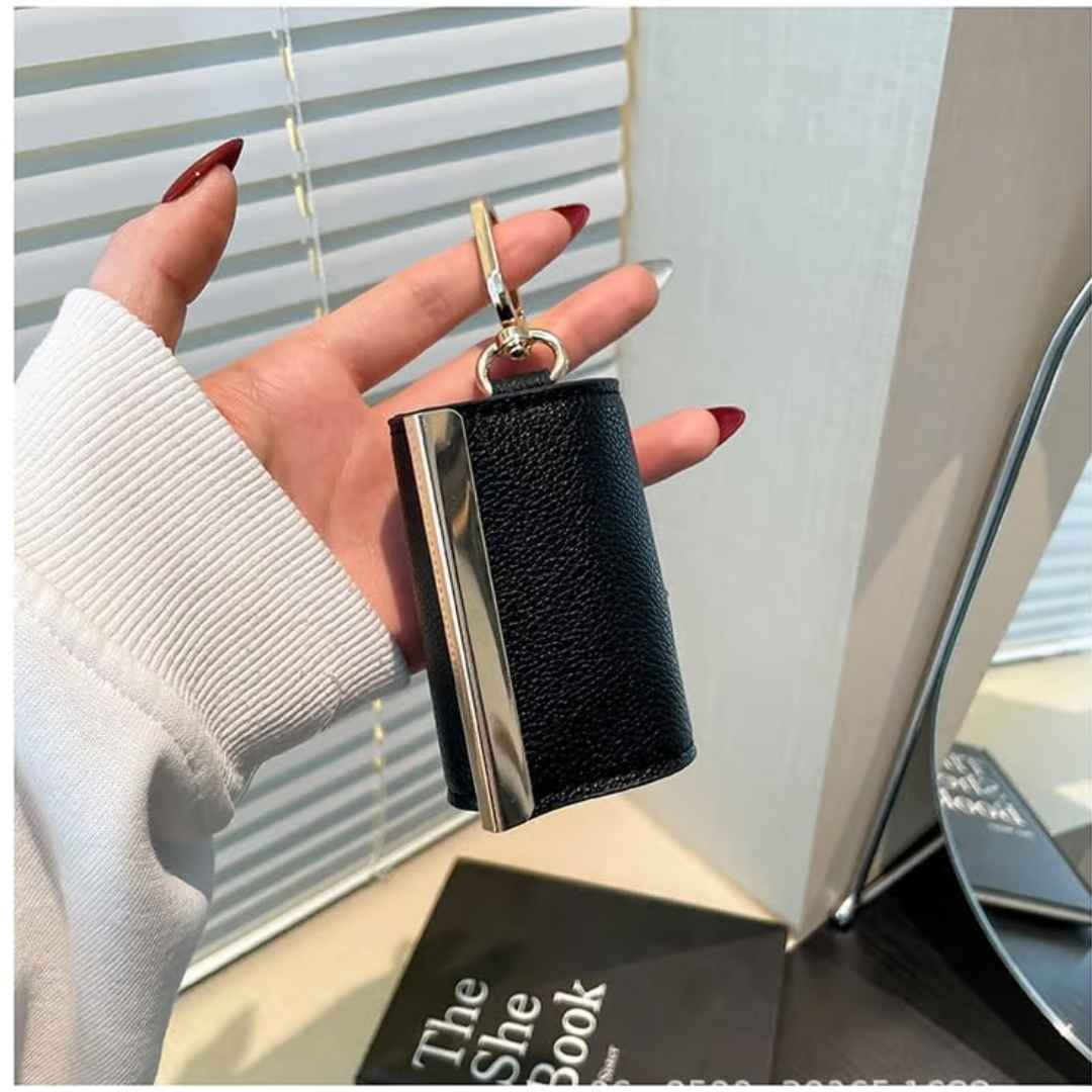 Bolsa multiusos tipo llavero: Lleva de todo a todo lado sin encartarte.